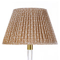Fermoie Nut Brown Rabanna empire lampshade styled on a glass table lamp in Nashville, Tennessee