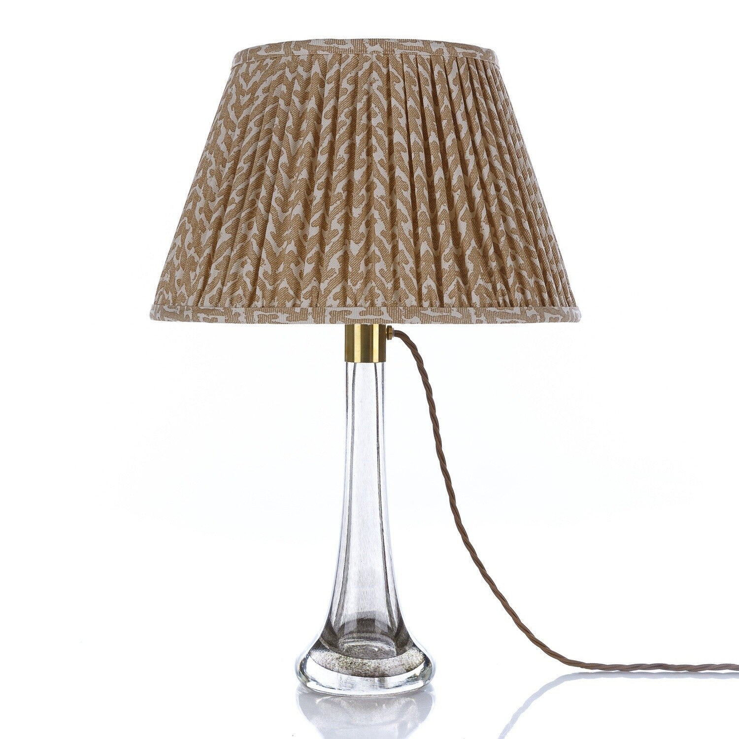Fermoie Nut Brown Rabanna Lampshade styled on a glass table lamp in Nashville, Tennessee