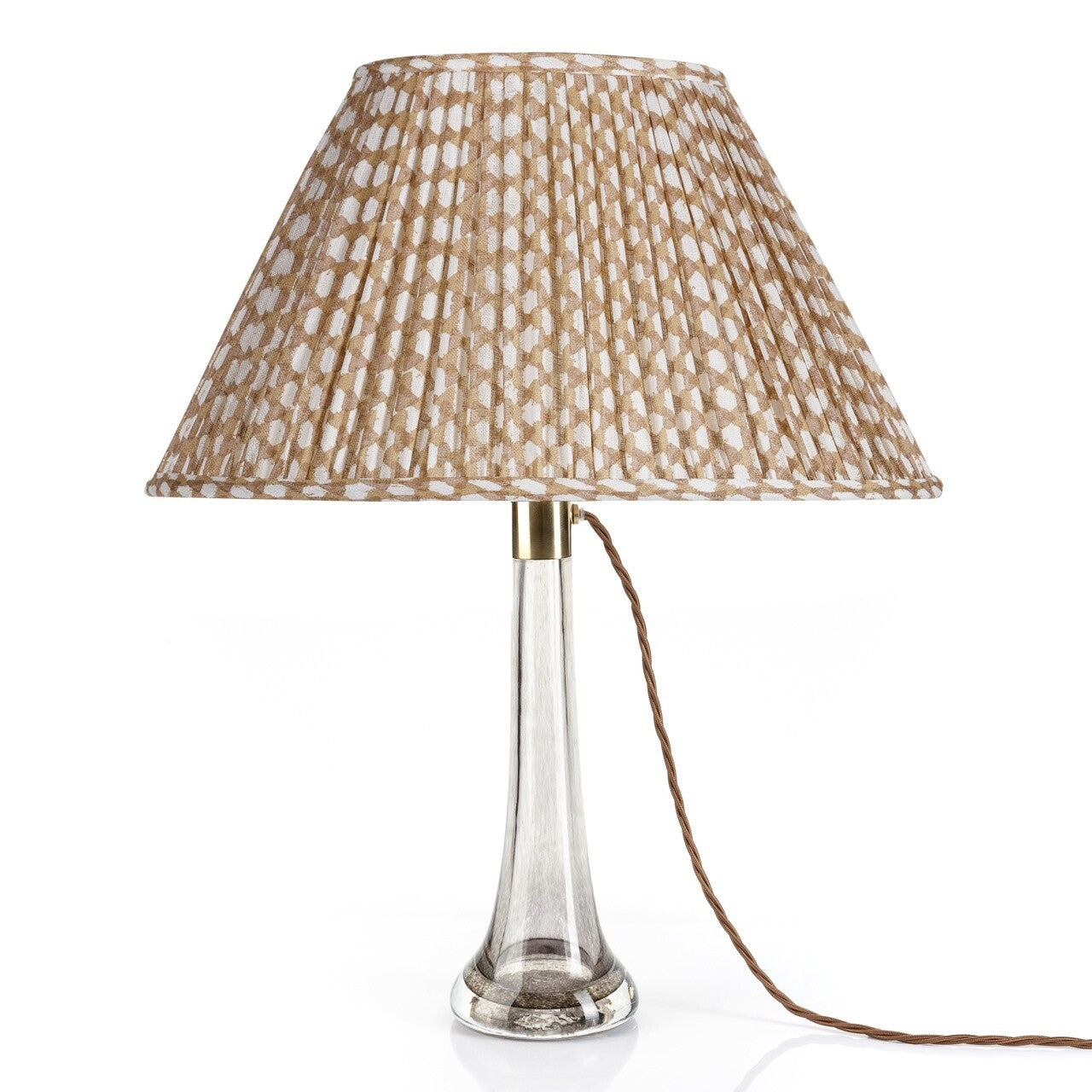 Fermoie Nut Brown Wicker oval lampshade styled on a glass table lamp in Nashville, Tennessee