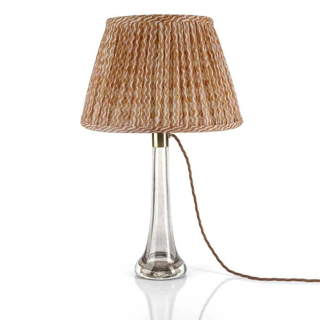 Fermoie Orange Popple Empire lampshade styled on a glass table lamp in Nashville, Tennessee