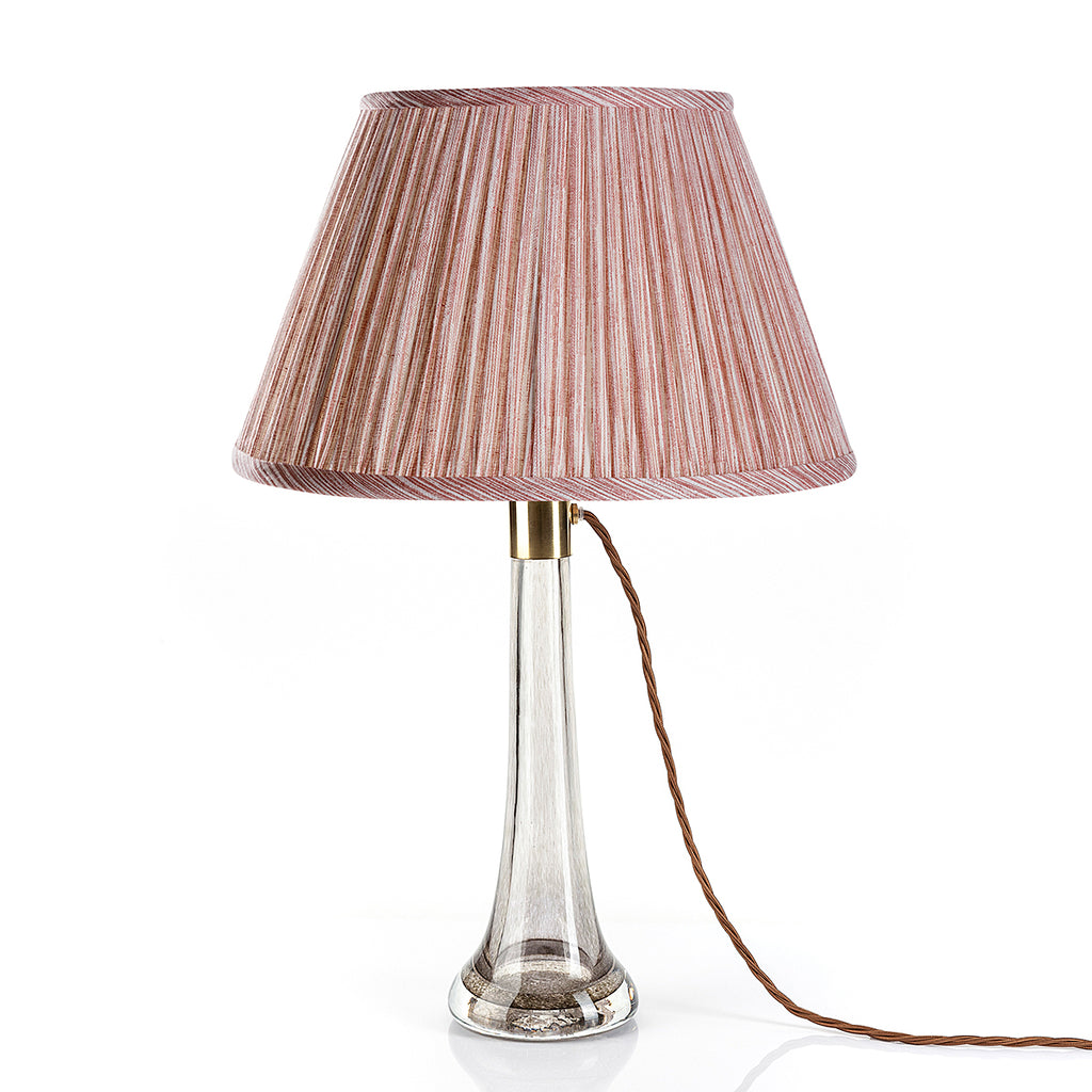 Fermoie Pink Strié Empire lampshade styled on a glass table lamp in Nashville, Tennessee