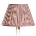 Fermoie Pink Strié empire lampshade styled on a glass table lamp in Nashville, Tennessee