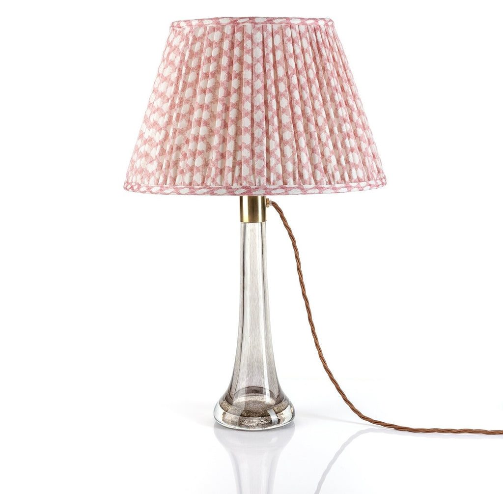 Fermoie Pink Wicker empire lampshade styled on a glass table lamp in Nashville, Tennessee
