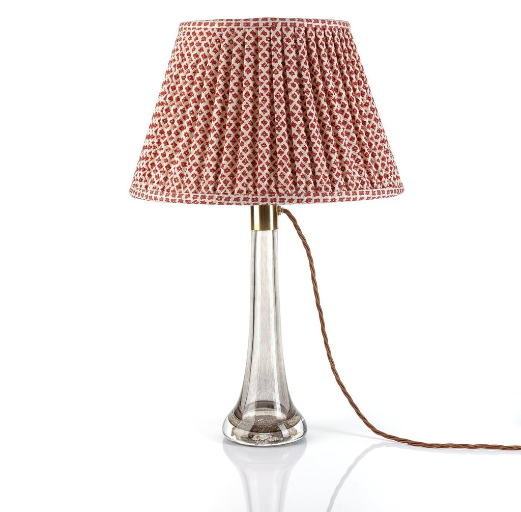 Fermoie Red Marden Empire lampshade styled on a glass table lamp in Nashville, Tennessee