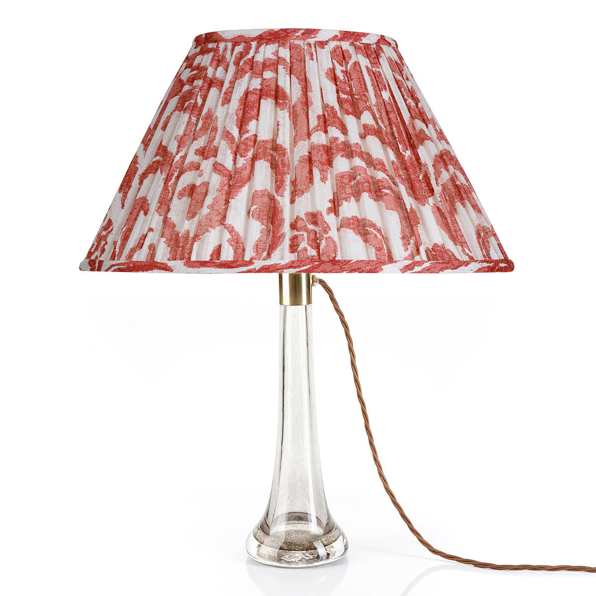 Fermoie Red Marlborough oval lampshade styled on a glass table lamp in Nashville, Tennessee