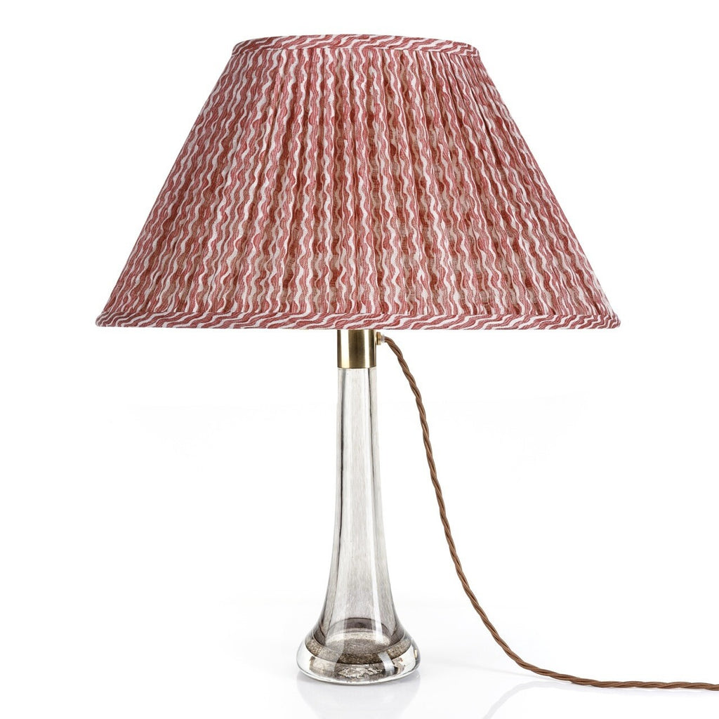 Fermoie Red Popple oval lampshade styled on a glass table lamp in Nashville, Tennessee
