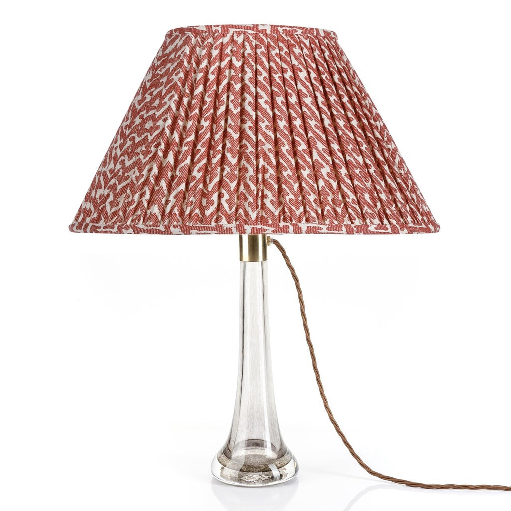 Fermoie Red Rabanna empire lampshade styled on a glass table lamp in Nashville, Tennessee