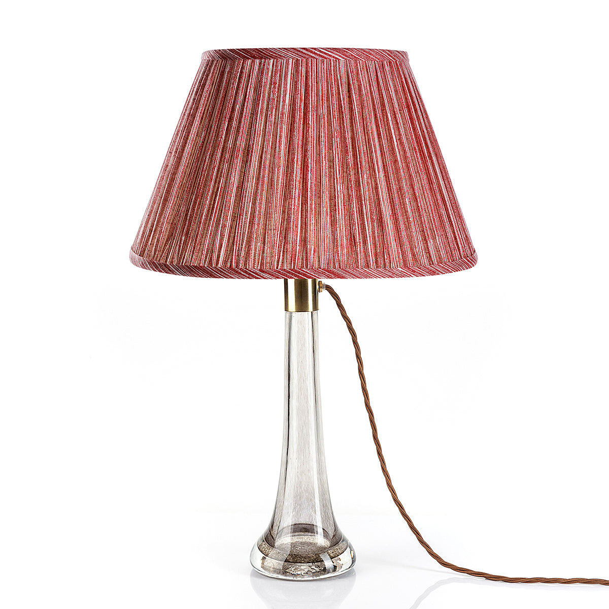 Fermoie Red Strié Empire lampshade styled on a glass table lamp in Nashville, Tennessee