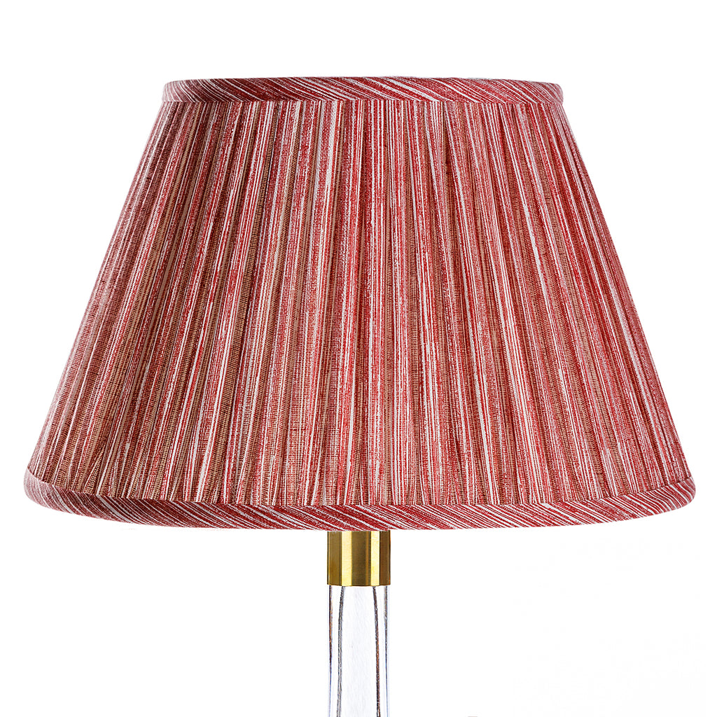 Fermoie Red Strié empire lampshade styled on a glass table lamp in Nashville, Tennessee