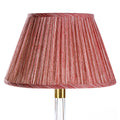 Fermoie Red Strié empire lampshade styled on a glass table lamp in Nashville, Tennessee