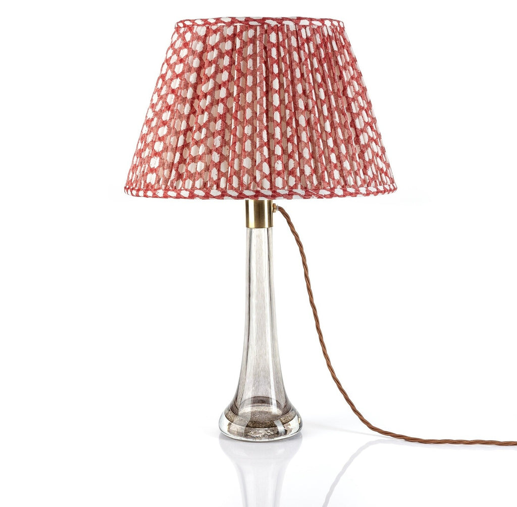 Fermoie Red Wicker empire lampshade styled on a glass table lamp in Nashville, Tennessee