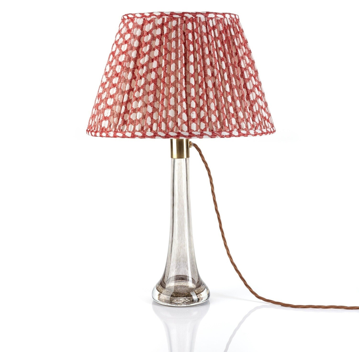 Fermoie Red Wicker empire lampshade styled on a glass table lamp in Nashville, Tennessee