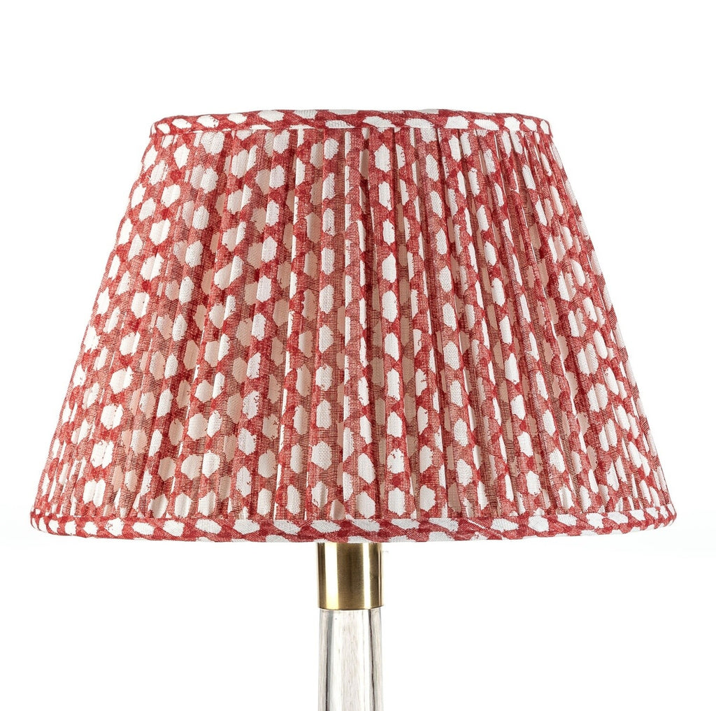 Fermoie Red Wicker empire lampshade styled on a glass table lamp in Nashville, Tennessee