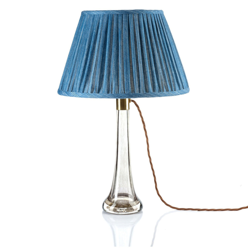 Fermoie Sacre Bleu Empire lampshade styled on a glass table lamp in Nashville, Tennessee
