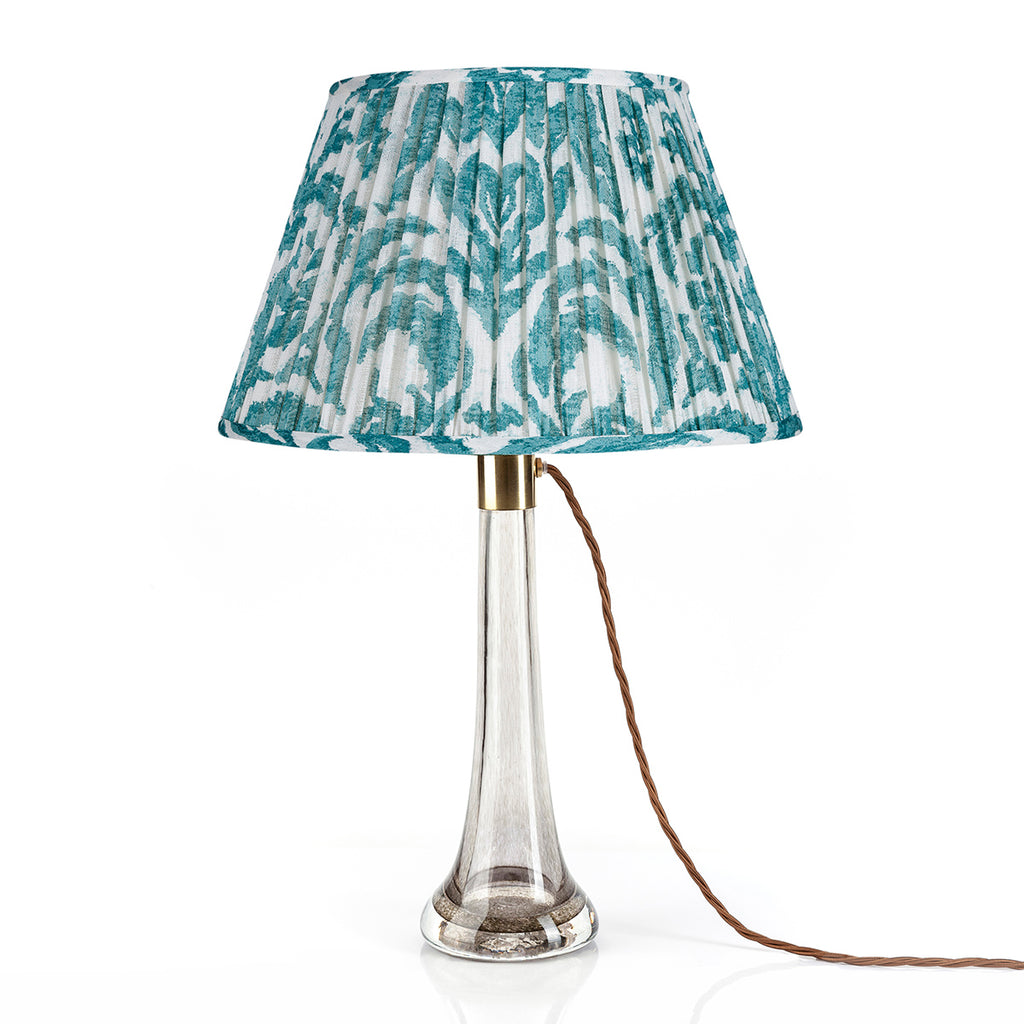 Fermoie Teal Marlborough empire lampshade styled on a glass table lamp in Nashville, Tennessee