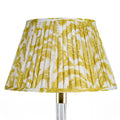 Fermoie Yellow Marlborough empire lampshade styled on a glass table lamp in Nashville, Tennessee