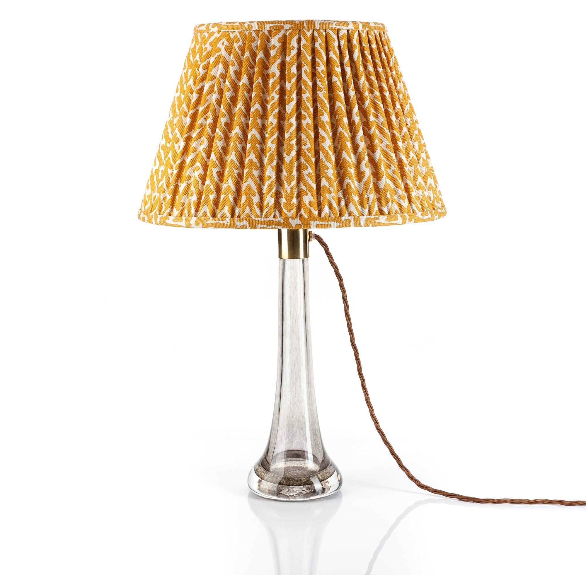 Fermoie Yellow Rabanna empire lampshade styled on a glass table lamp in Nashville, Tennessee