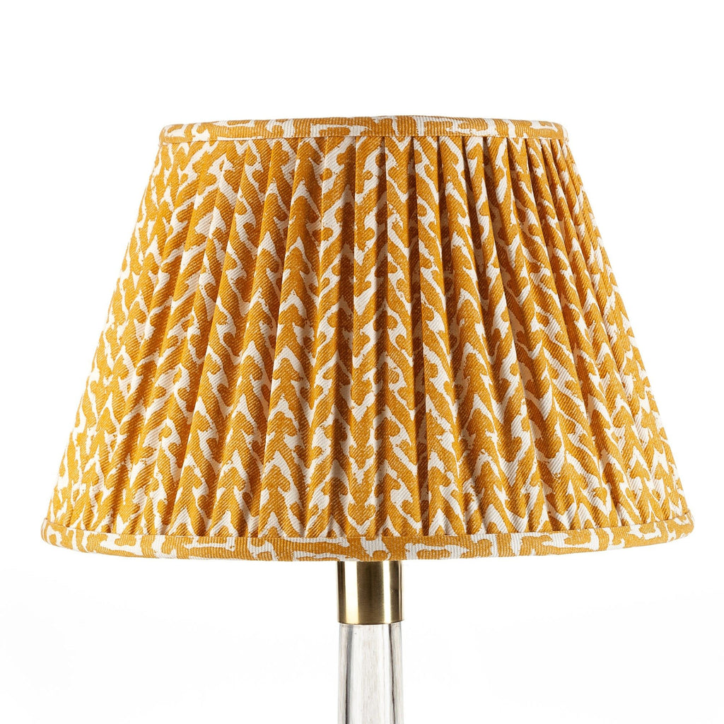 Fermoie Yellow Rabanna empire lampshade styled on a glass table lamp in Nashville, Tennessee