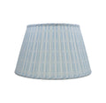 Annabelle Pleated Lampshade featuring a powder blue and white geometric pattern, finely pleated fabric, classic empire silhouette, and coordinating patterned trim.