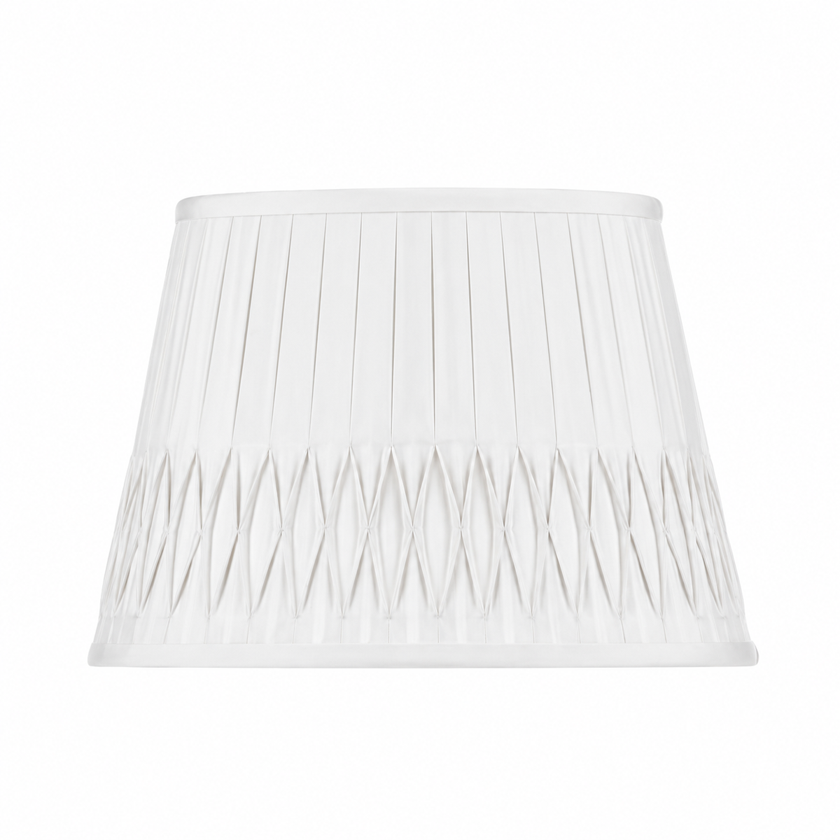Bone linen lampshade with vertical pleating and intricate bottom smocked detailing in a tapered empire silhouette.