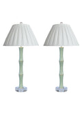 Porcelain jade green buffet lamps with acrylic base and finial.