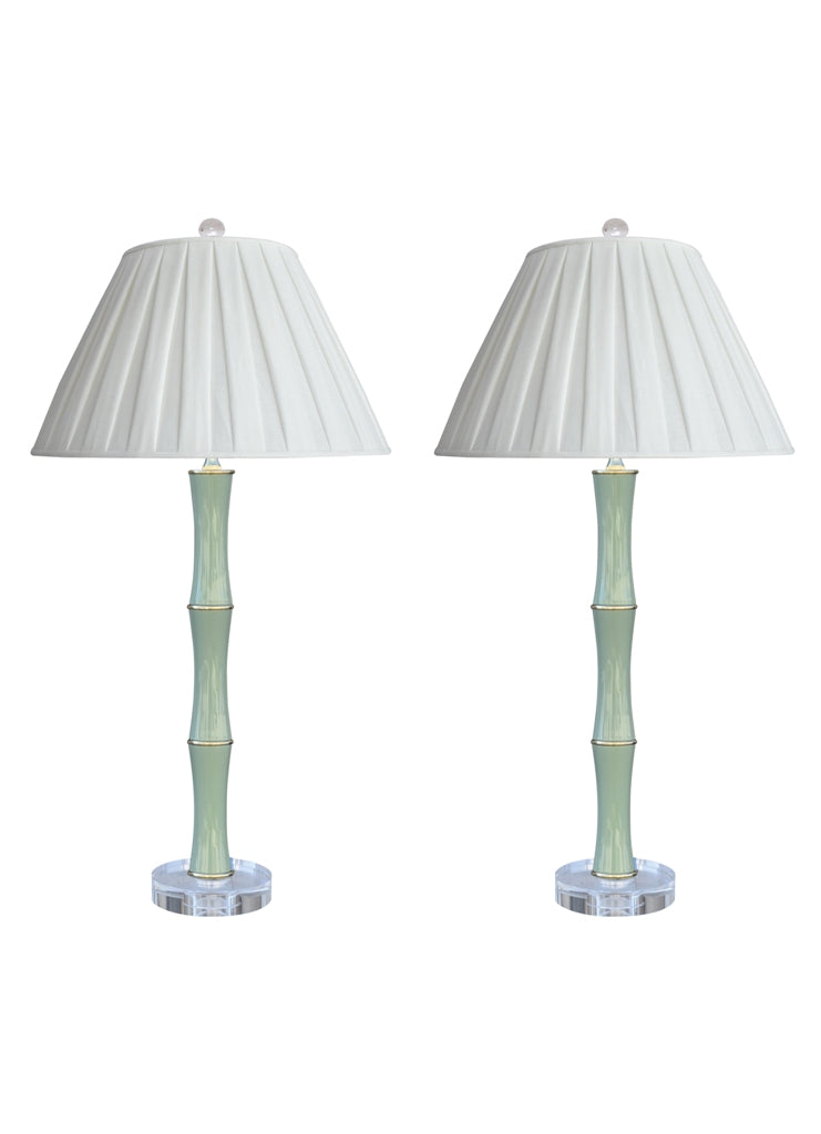 Porcelain jade green buffet lamps with acrylic base and finial.