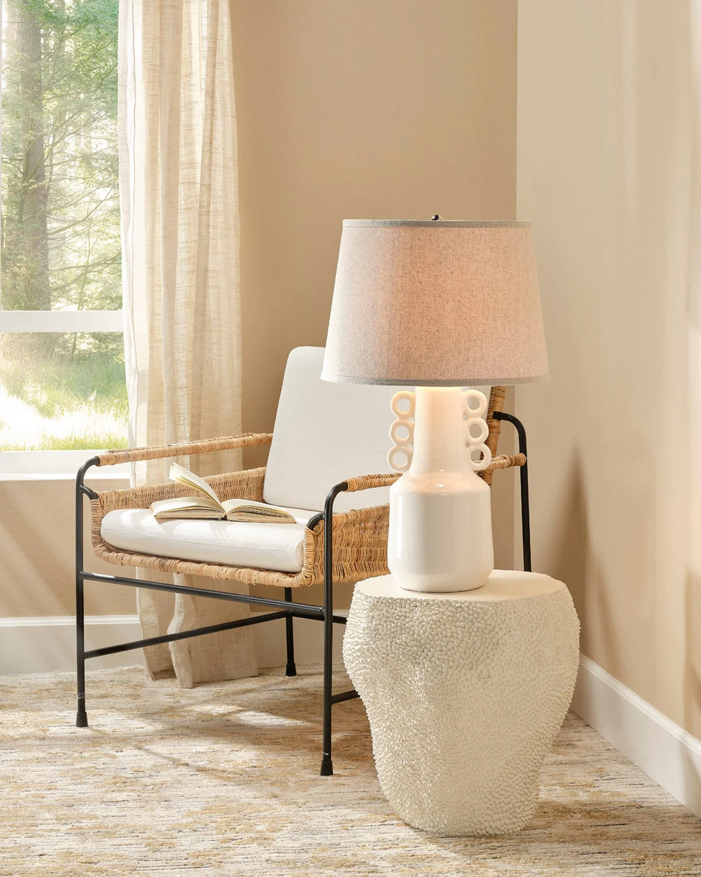 Paros Table Lamp in white styled in a living room with natural, earthy textures in Nashville, Tennessee