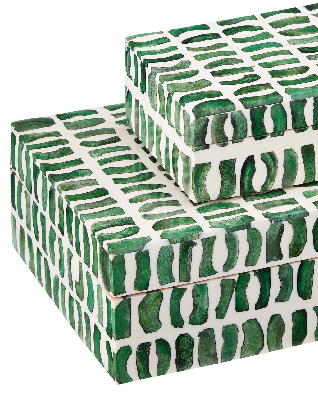 Green and white decorative box set made from bone and wood close up shot