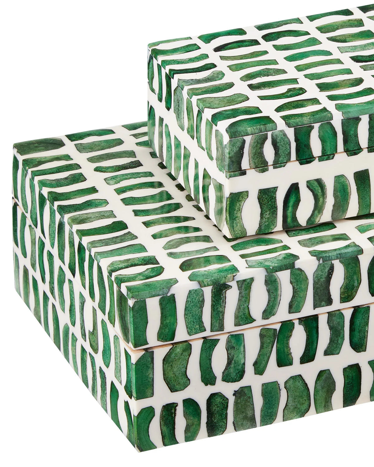 Green and white decorative box set made from bone and wood close up shot