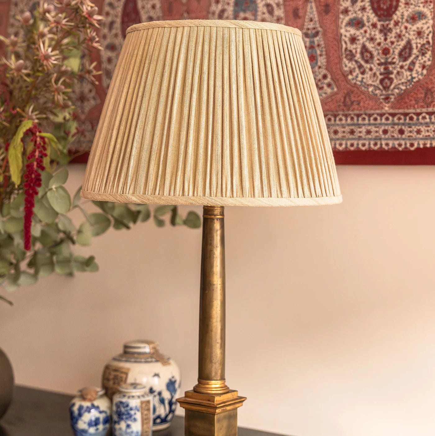 Nushka Raw Umber Mulberry Silk Empire lampshade styled on an oriental table lamp in Nashville, Tennessee