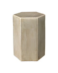 Hexagonal ceramic stool in a light beige glaze with a subtle textured finish, shown on a plain white background.