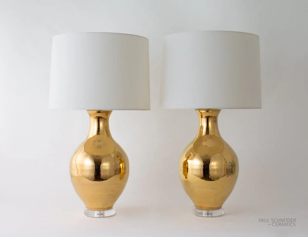 Paul Schneider Athens Lustre in Gold Lamp styled with white drum shades