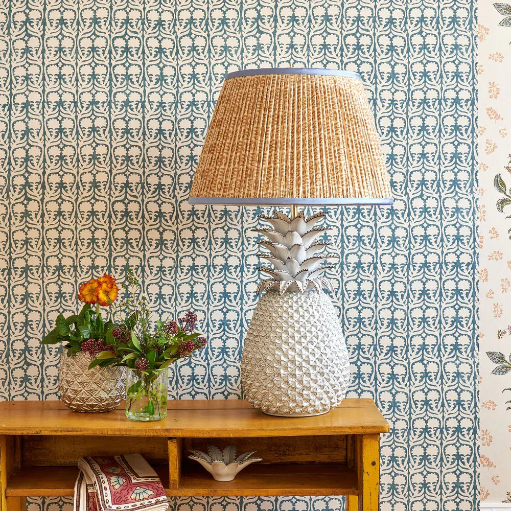 Penny Morrison Cinnamon on White Tribal Lampshade with Blue Trim styled on a white coastal table lamp in Nashville, Tennessee