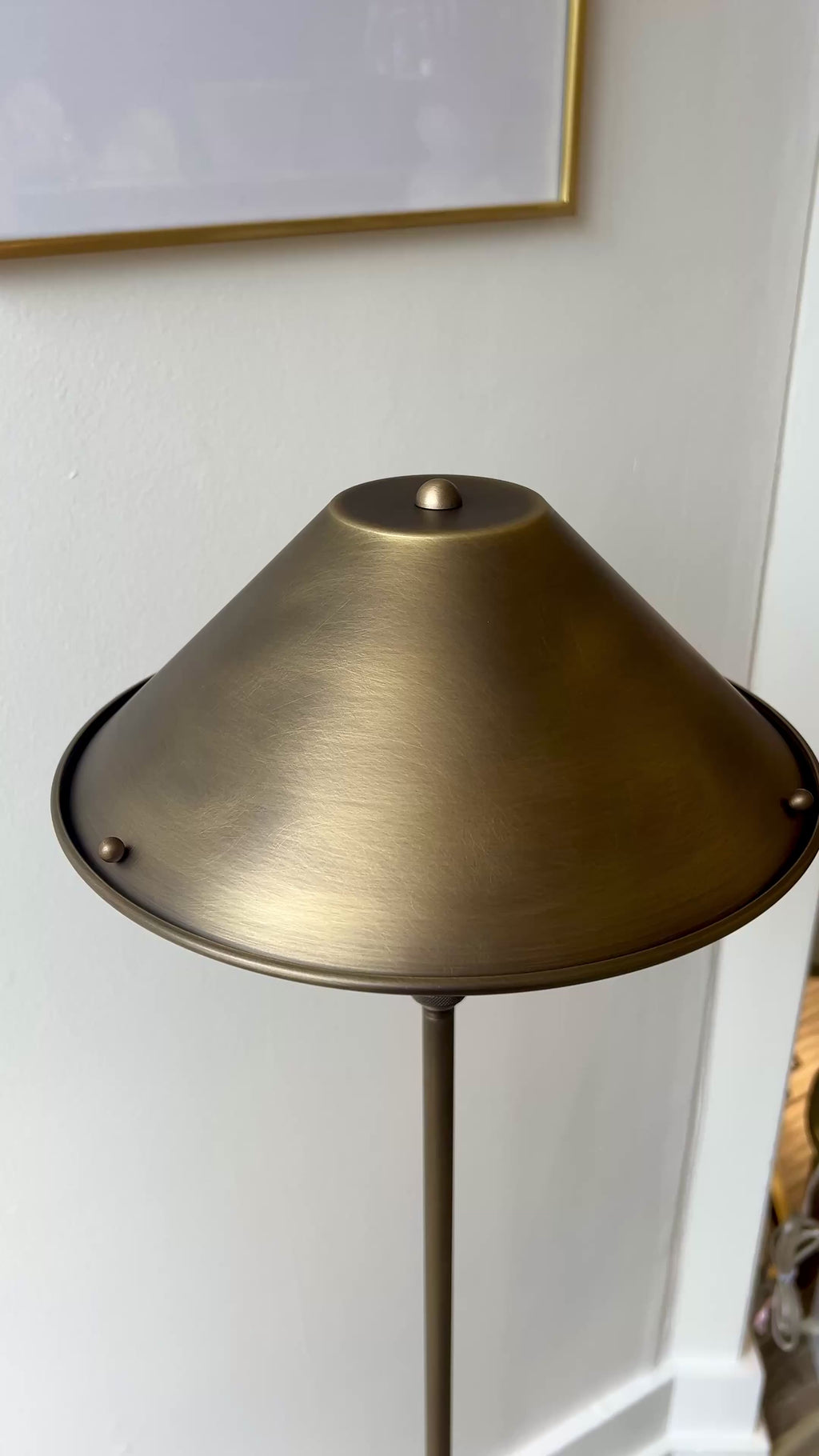 Anna Lari cordless rechargable floor lamp in an antique brass finish
