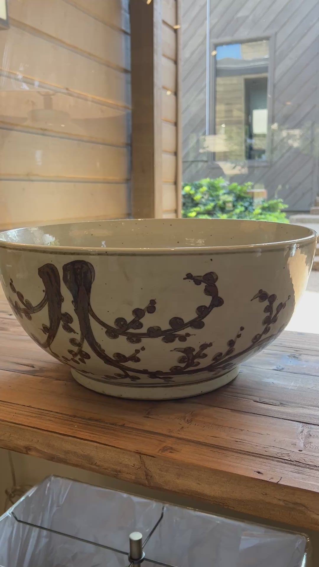 Cream and brown ceramic decorative bowl with Asian inspired branch and blossom motif 