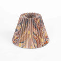Red and blue marbled lampshade with accordian style pleats
