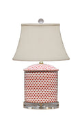 Traditional style red and white fishscale table lamps with acrylic base and finial.