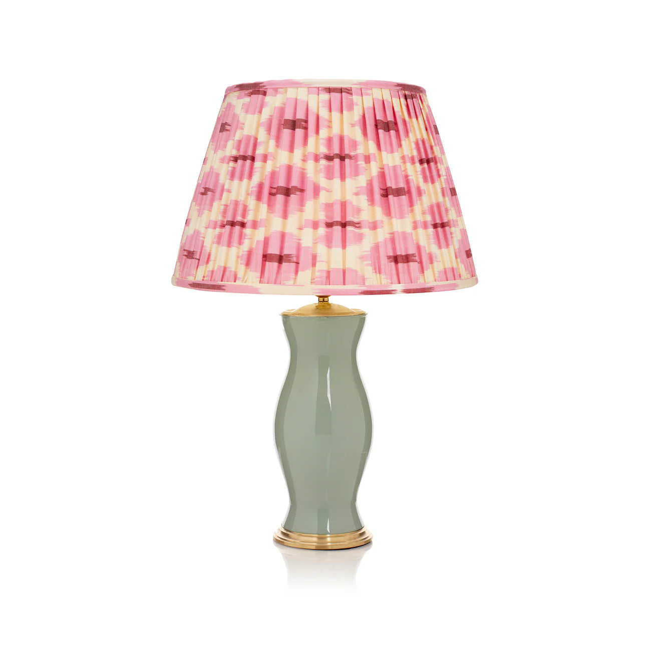 Rosanna Lonsdale Pink and Cream Ikat Lampshade styled on a grey ceramic table lamp in Nashville, Tennessee
