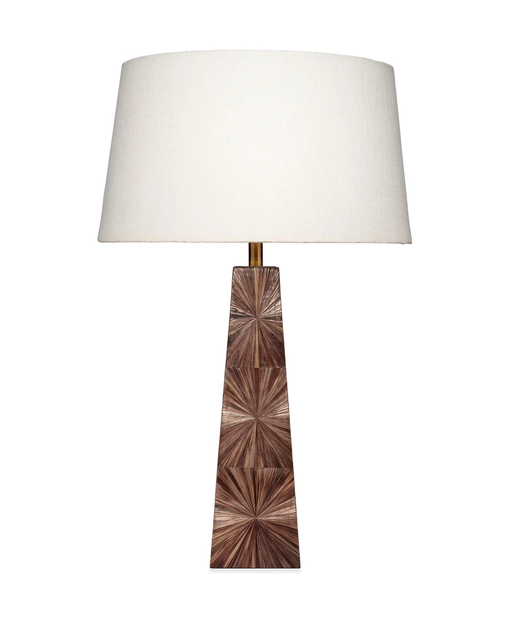 Solana Table Lamp featuring a rich brown dyed-straw base with a radiating sunburst pattern, antique brass accents, and a classic white linen drum shade.