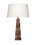 Solana Table Lamp featuring a rich brown dyed-straw base with a radiating sunburst pattern, antique brass accents, and a classic white linen drum shade.