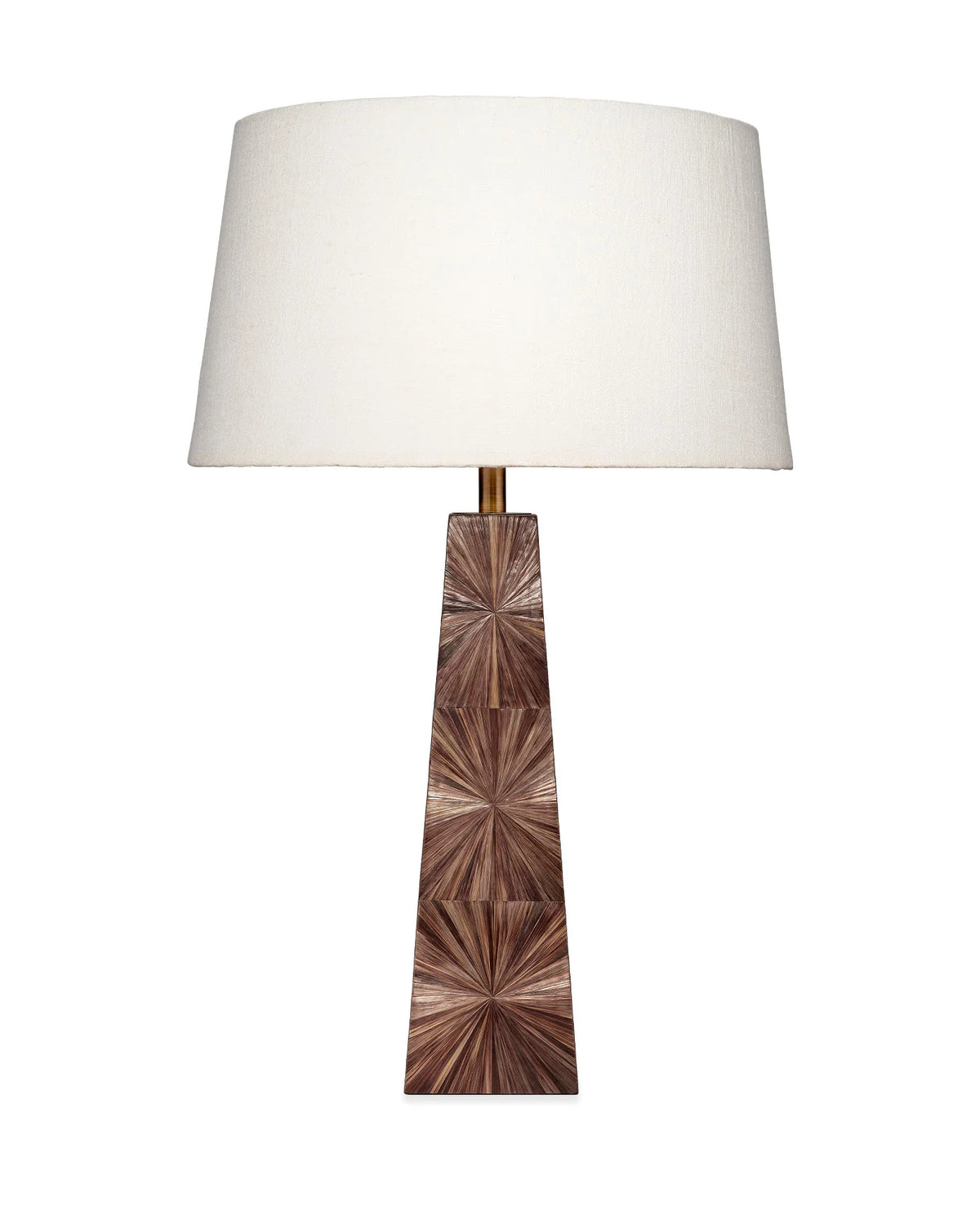 Solana Table Lamp featuring a rich brown dyed-straw base with a radiating sunburst pattern, antique brass accents, and a classic white linen drum shade.