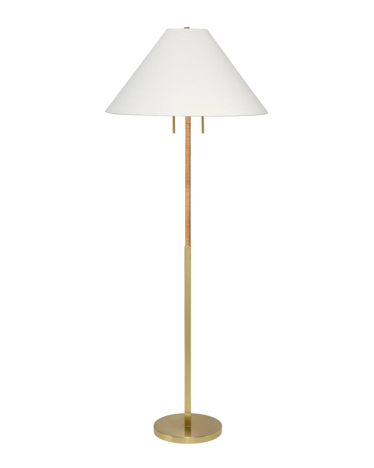 A modern floor lamp with a tapered white fabric shade, a slim brass-finished metal stem hand-wrapped in rattan, and a round brass base, shown against a plain white background.