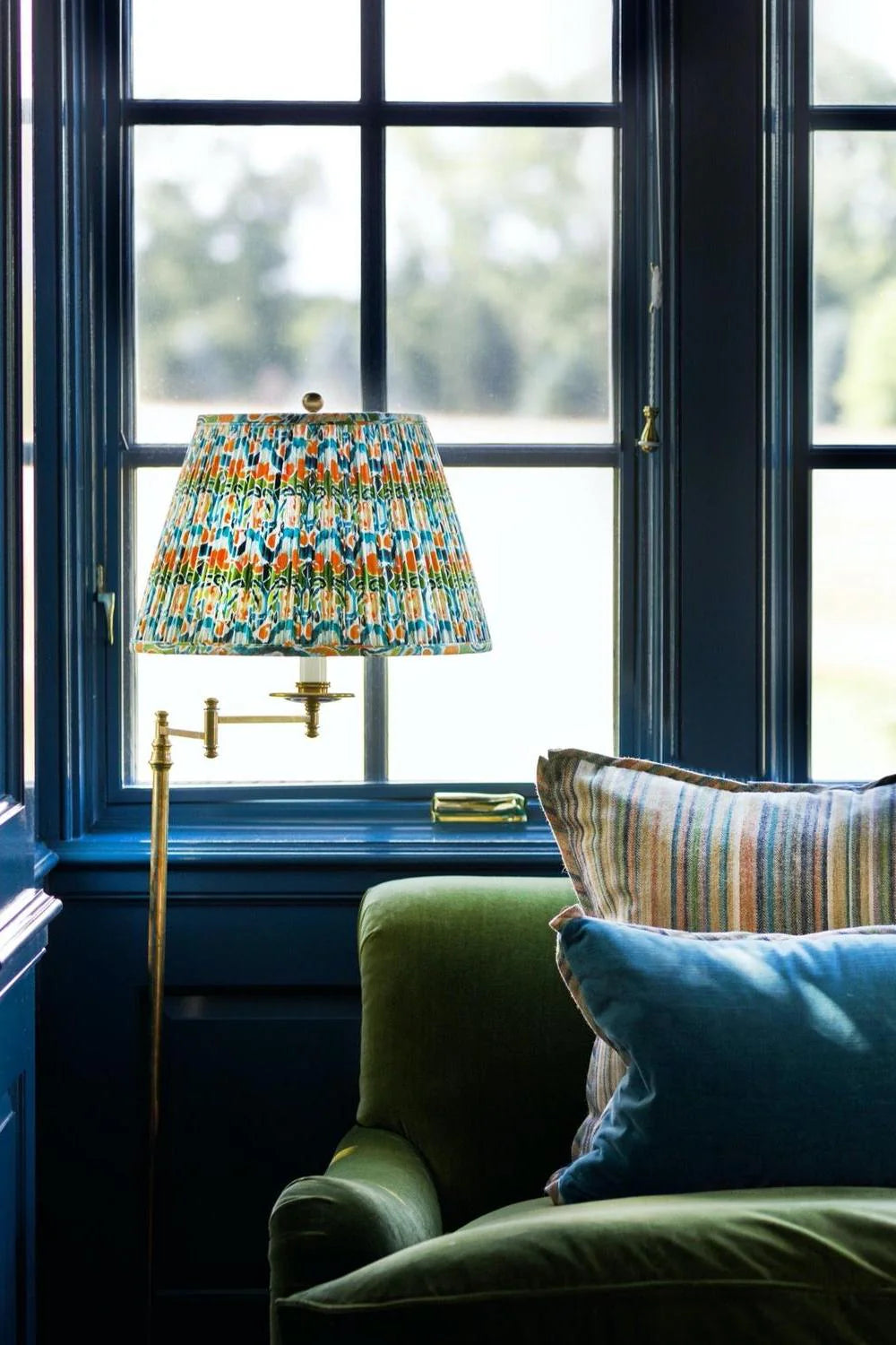 Sorella Glen Green Kaleidoscope Empire Lampshade styled on a brass floor lamp in Nashville, Tennessee