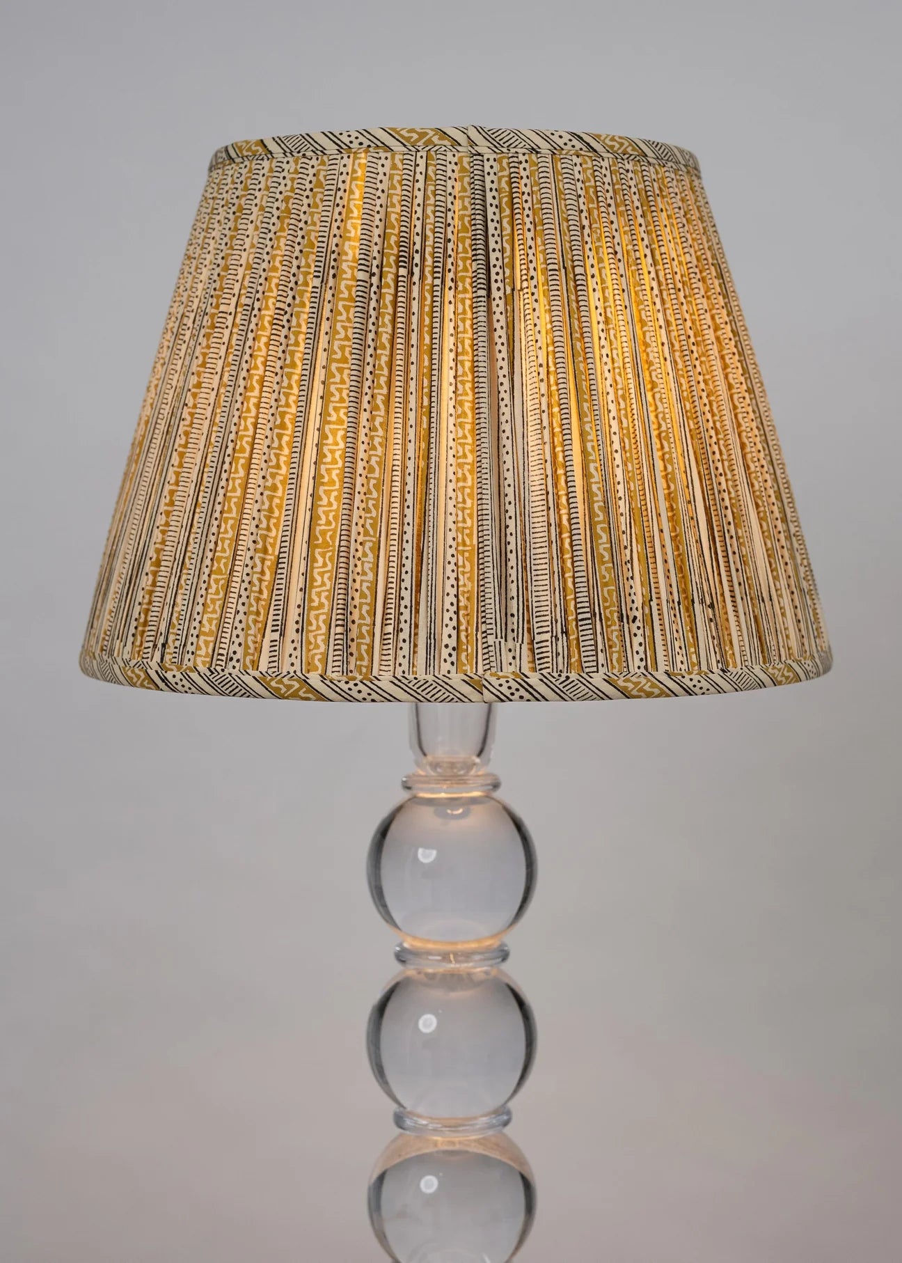Sorella Glen Jaipur Dot & Dash Empire Lampshade styled on an acrylic table lamp in Nashville, Tennessee