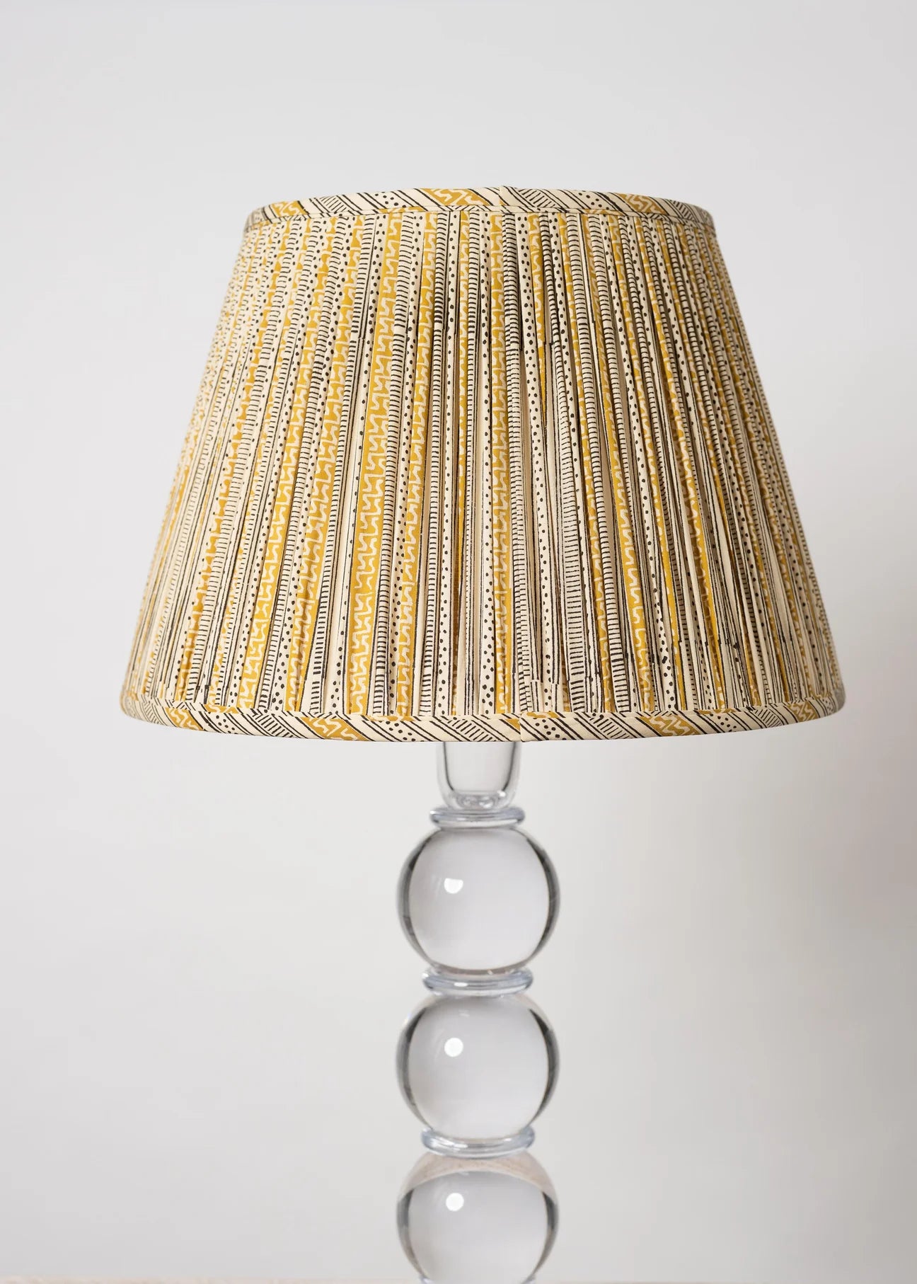 Sorella Glen Jaipur Dot & Dash Empire Lampshade styled on an acrylic table lamp in Nashville, Tennessee