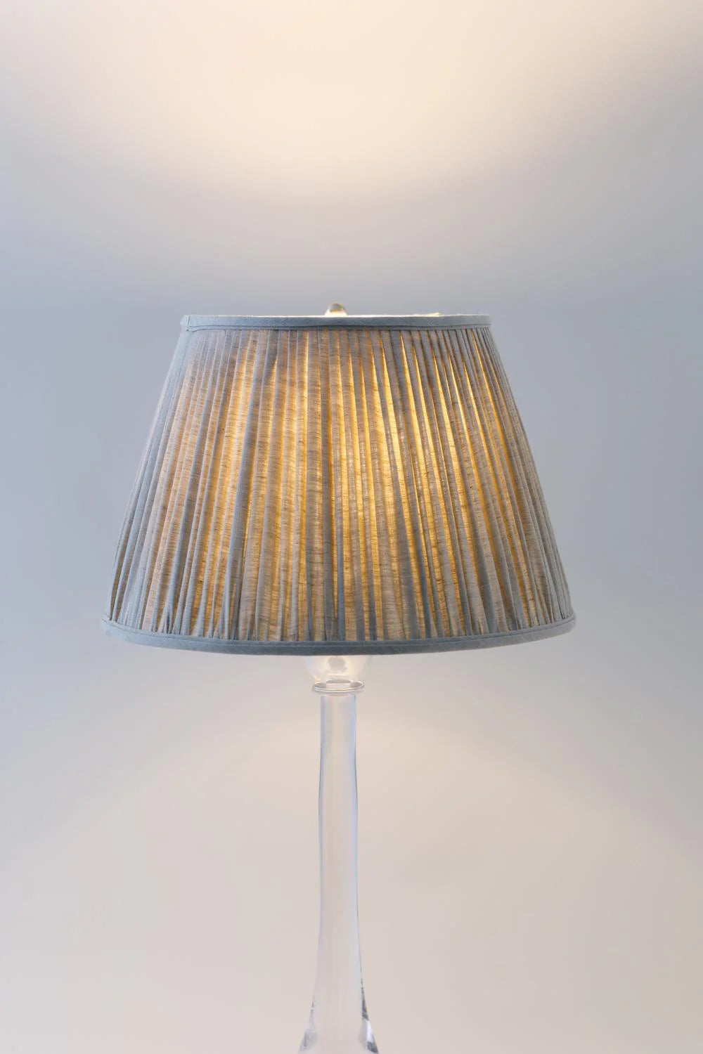 Sorella Glen Oatmeal Shirred Empire Lampshade styled on an acrylic table lamp in Nashville, Tennessee