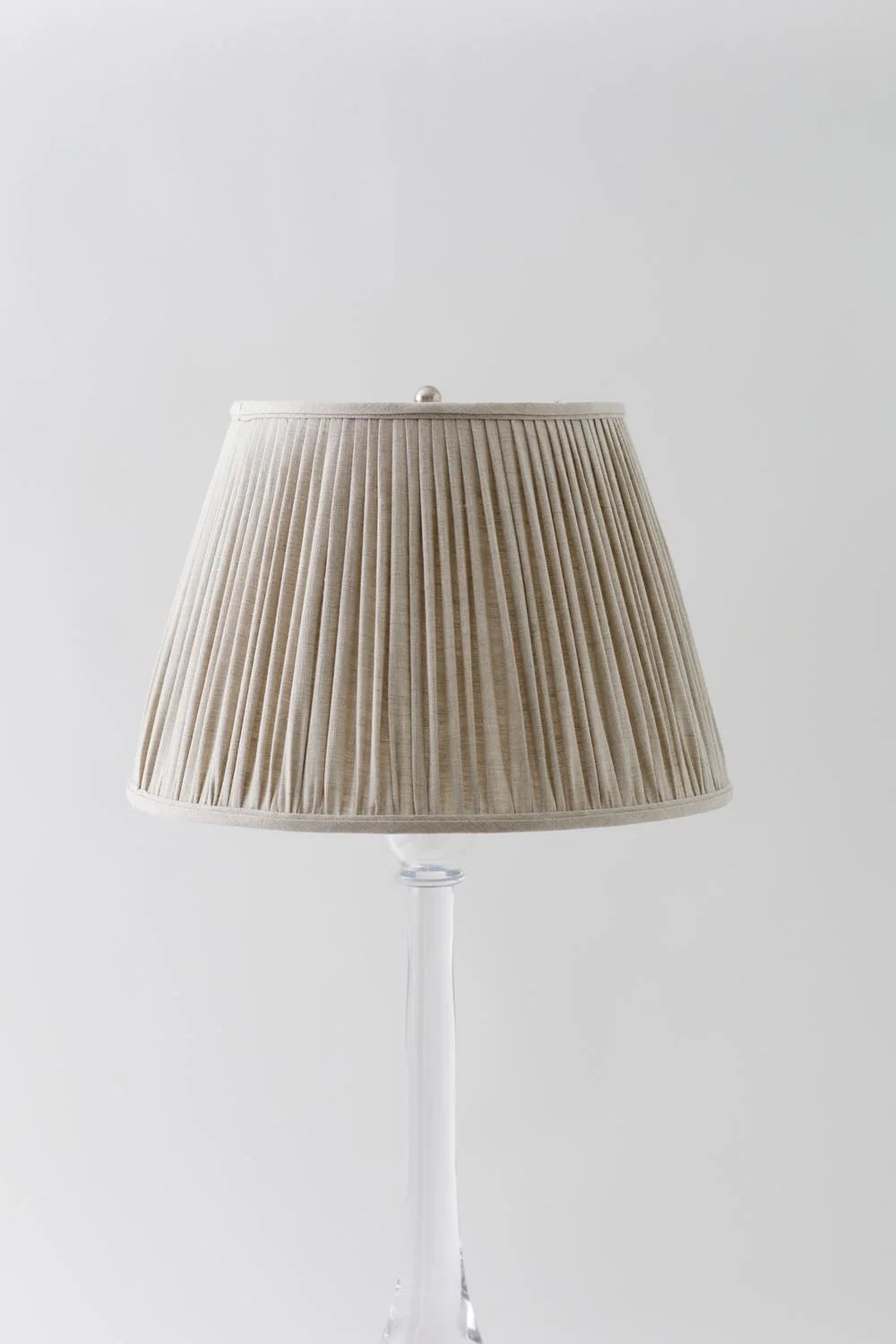 Sorella Glen Oatmeal Shirred Empire Lampshade styled on an acrylic table lamp in Nashville, Tennessee