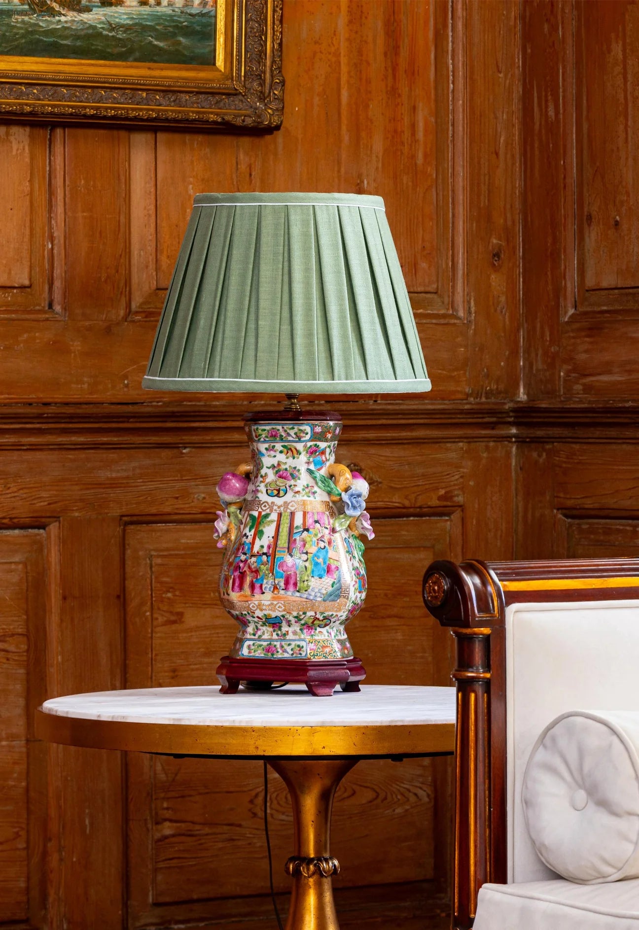 Sorella Glen Olive Box Pleat Empire Lampshade styled on a celadon ceramic table lamp in Nashville, Tennessee