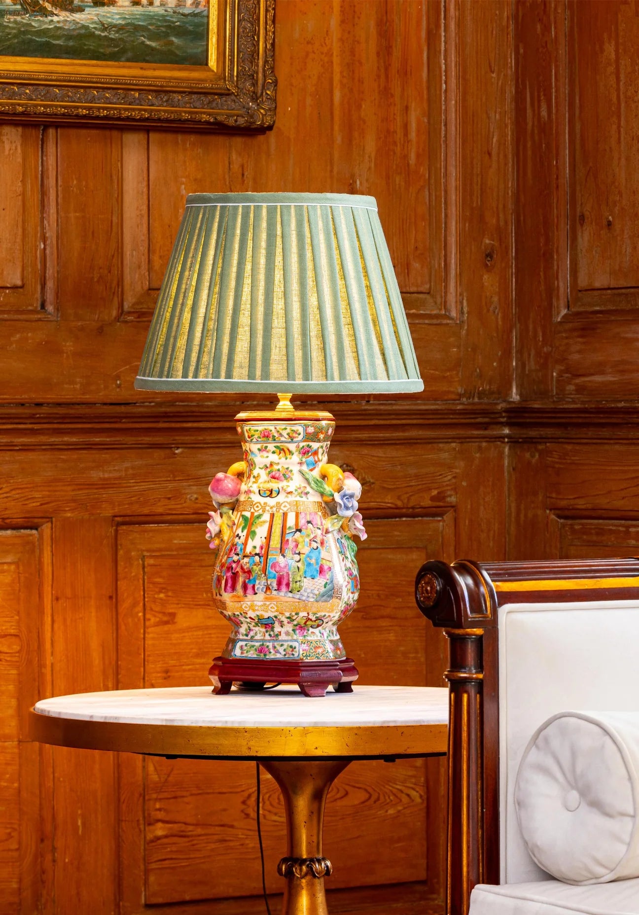 Sorella Glen Olive Box Pleat Empire Lampshade styled on a celadon ceramic table lamp in Nashville, Tennessee
