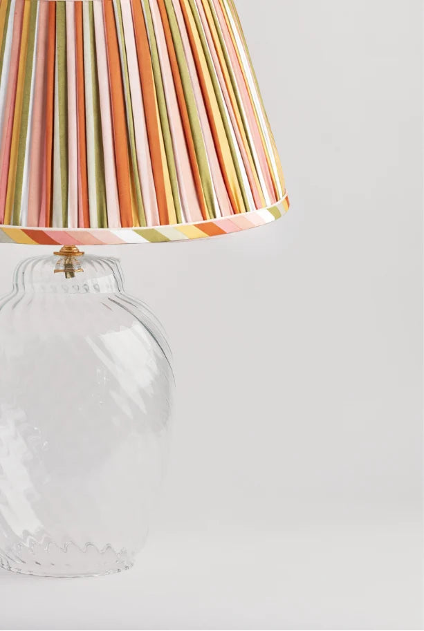 Sorella Glenn Bermuda Stripe Empire Lampshade with Skinny Sand Trim styled on a glass table lamp in Nashville, Tennessee